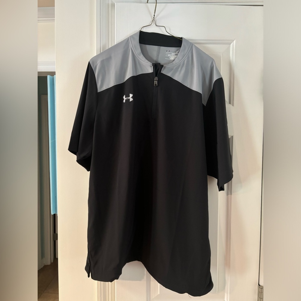 Under Armour cage jacket in excellent condition. Size Medium. Smoke free home
